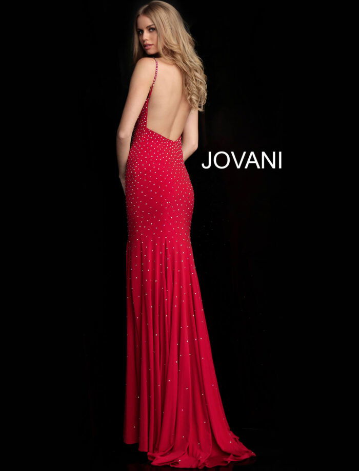 Model showcasing the back of Jovani 63563 red dress with open back