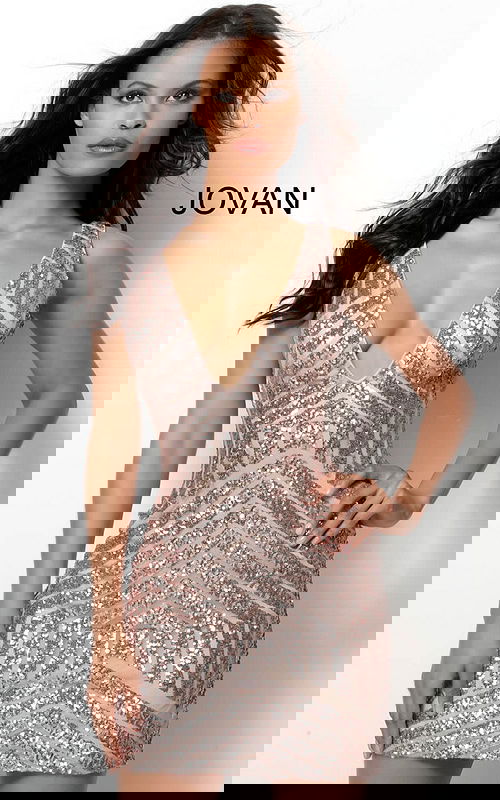 Model wearing Jovani 63899 blush sequin dress with deep V-neckline and short silhouette.
