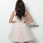 Back view of model in Jovani 63987 dress with floral details.
