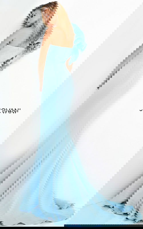 Back view of Jovani 63994 light blue mermaid dress with one-shoulder ruffle.