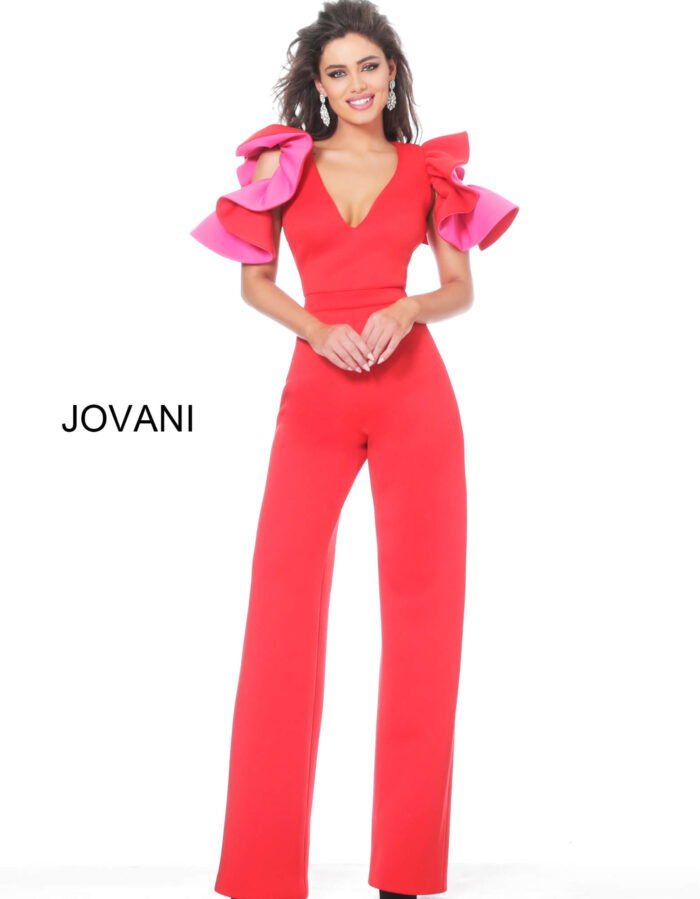 Model wearing Jovani 68736 red jumpsuit with pink ruffled sleeves, full-length front view.