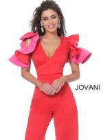 Model wearing Jovani 68736 red jumpsuit with pink ruffled sleeves, close-up front view.