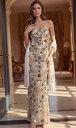 Elegant evening gown with a straight-across neckline, form-fitting silhouette, and vibrant floral accents.