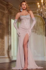 Model wearing Jovani D5016 front view beige embellished gown with high slit and gloves.
