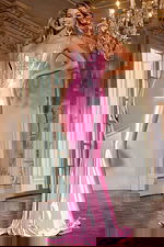 Model wearing D5054 dress in pink with a mermaid silhouette and plunging neckline.