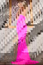 Model wearing Jovani D5417 pink dress with flowing train, back view.