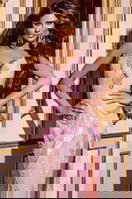 Model wearing Jovani D5715 pink dress, close-up of sweetheart neckline and beading.