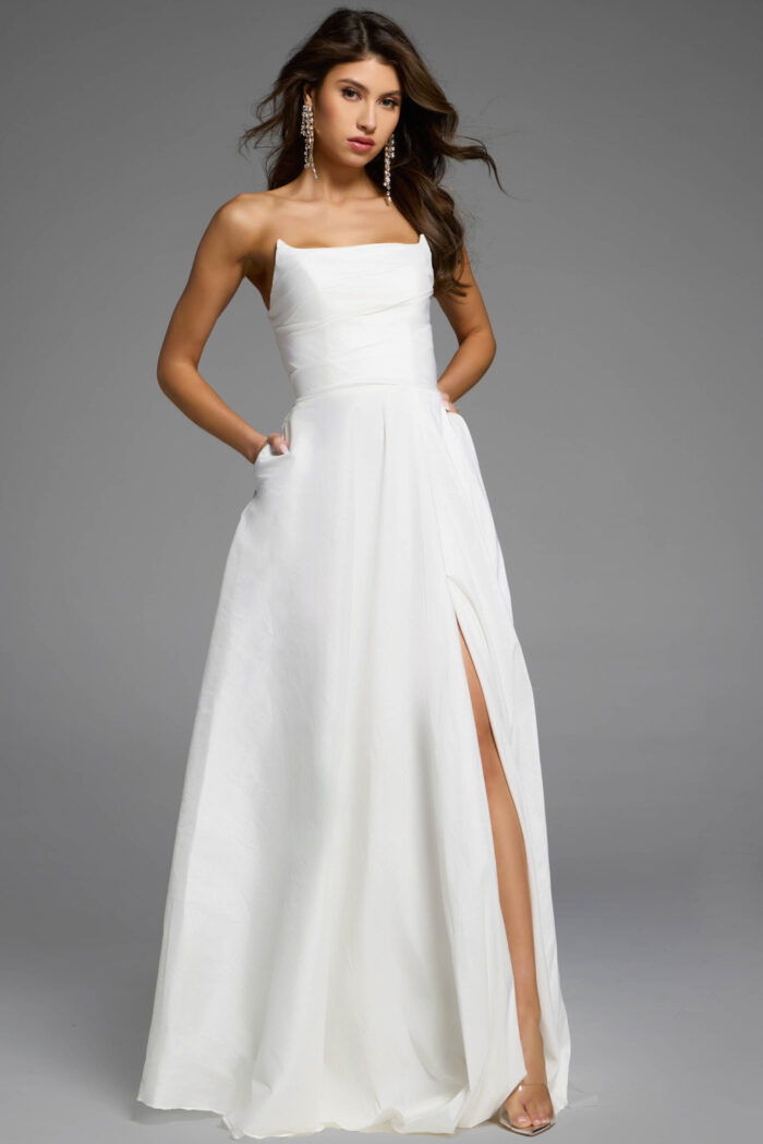 Elegant white gown with flowy skirt.