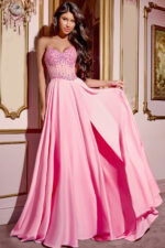 Model wearing Jovani D6021 pink gown with beaded bodice and sweetheart neckline.