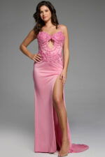 Side view of pink gown highlighting detailed beading and slit.