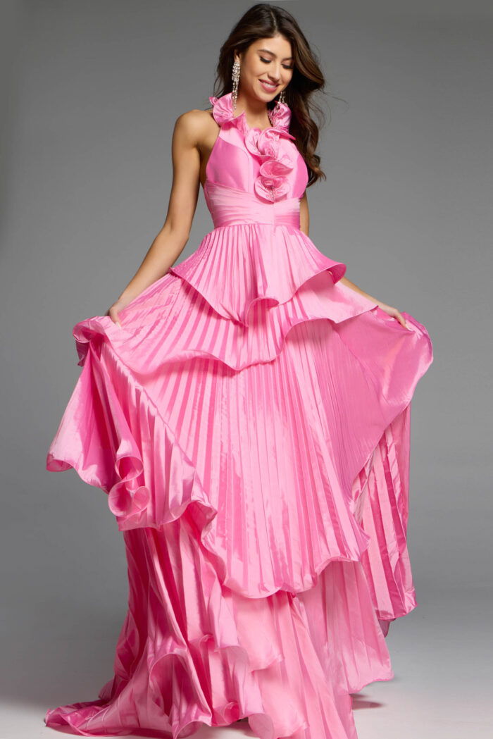 Pink formal gown featuring intricate floral embellishments and a sheer bodice.