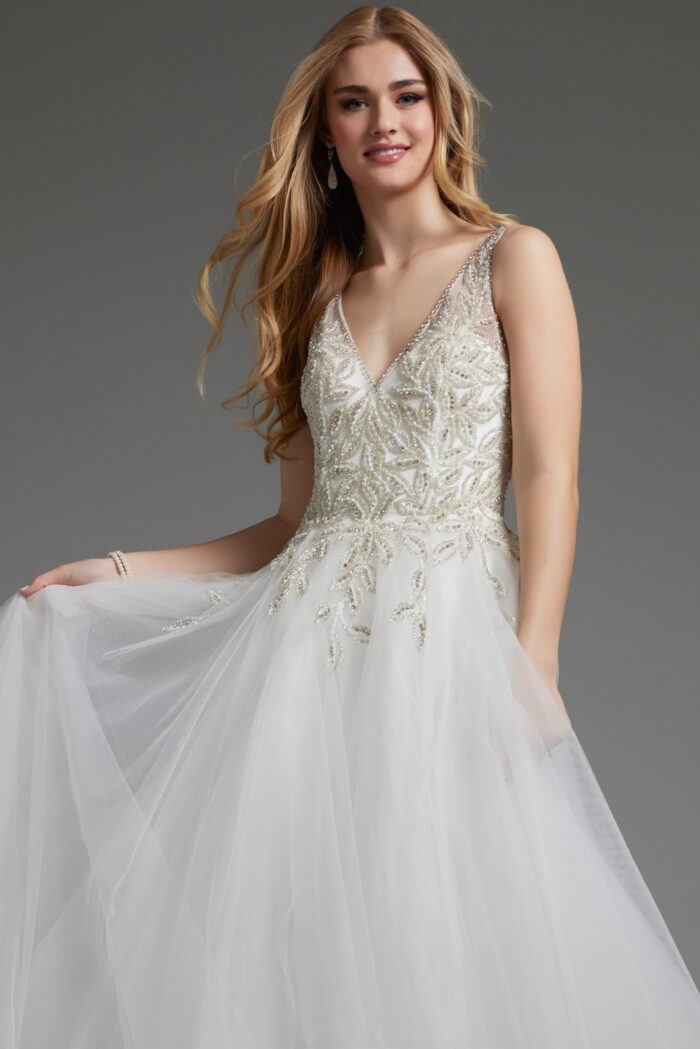 Close-up of Jovani JB03500 white gown showing V-neckline and beaded bodice.