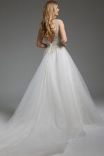 Back view of Jovani JB03500 white gown with low V-back and button detailing.