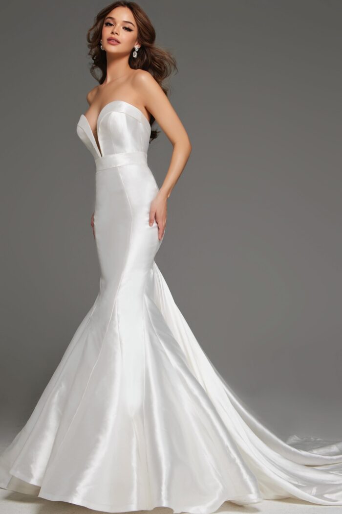 Model wearing JB05356 white mermaid dress, side view showcasing the flared skirt and strapless neckline.