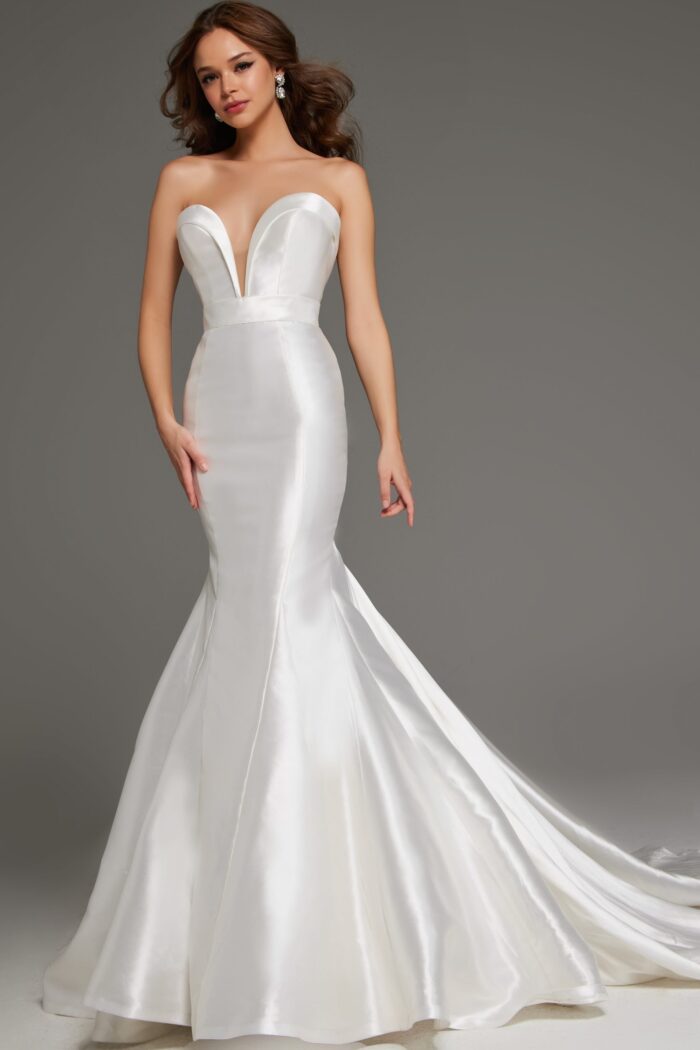 Model wearing JB05356 white mermaid dress, front view showing the strapless neckline and fitted silhouette.