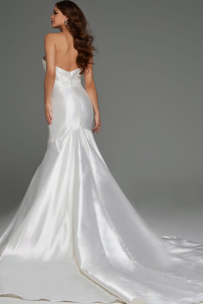Model wearing JB05356 white mermaid dress, back view highlighting the button detailing and train.