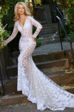 Front view of Jovani JB06861 ivory gown with deep V-neckline and lace.