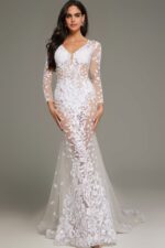 Model wearing Jovani JB06861 ivory gown with floral lace and deep V-neckline.
