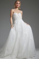 Model wearing Jovani JB07165 white gown showing A-line silhouette and floral appliqué, full front view.