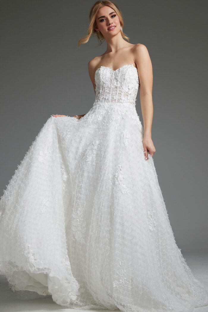 Model wearing Jovani JB07165 white gown with floral appliqué and sweetheart neckline, front view.