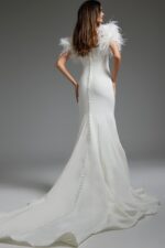 model wearing Jovani JB07433 elegant white gown with button detailing back view