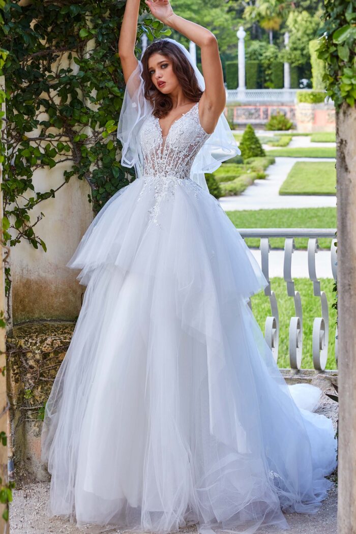 Model wearing Jovani jb09393 elegant white ball gown with lace details
