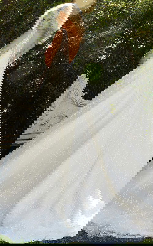 Back view of Jovani JB09491 white gown with a-line silhouette