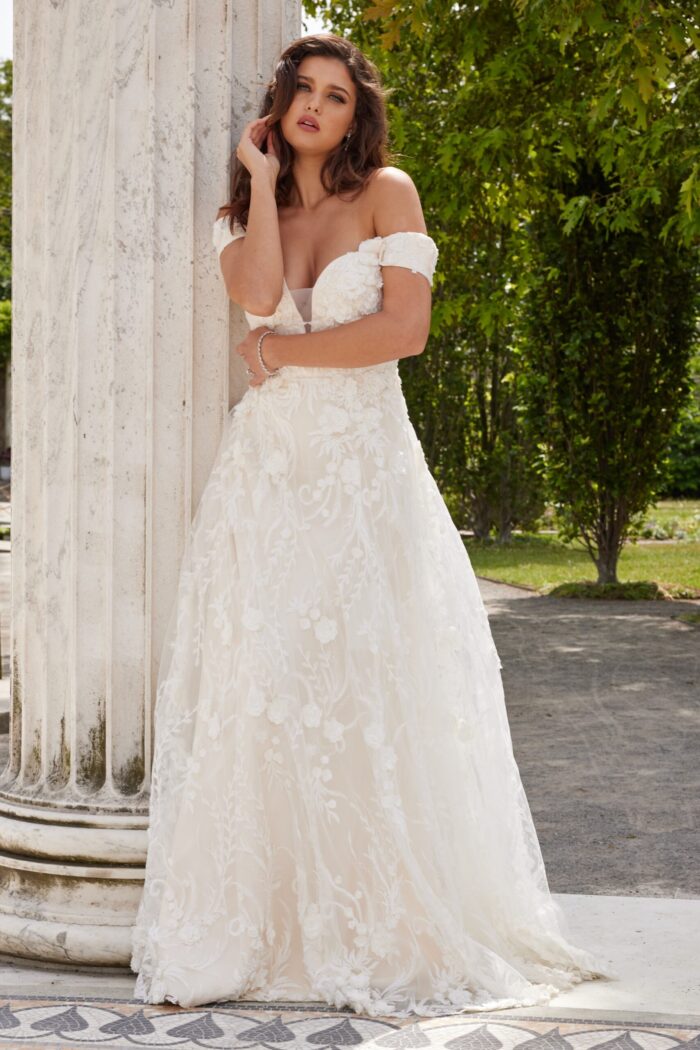 Model wearing Jovani JB220002 ivory dress front view with floral lace