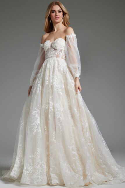 Model wearing Jovani JB220004 ivory gown with off-the-shoulder design and sheer sleeves, front view.