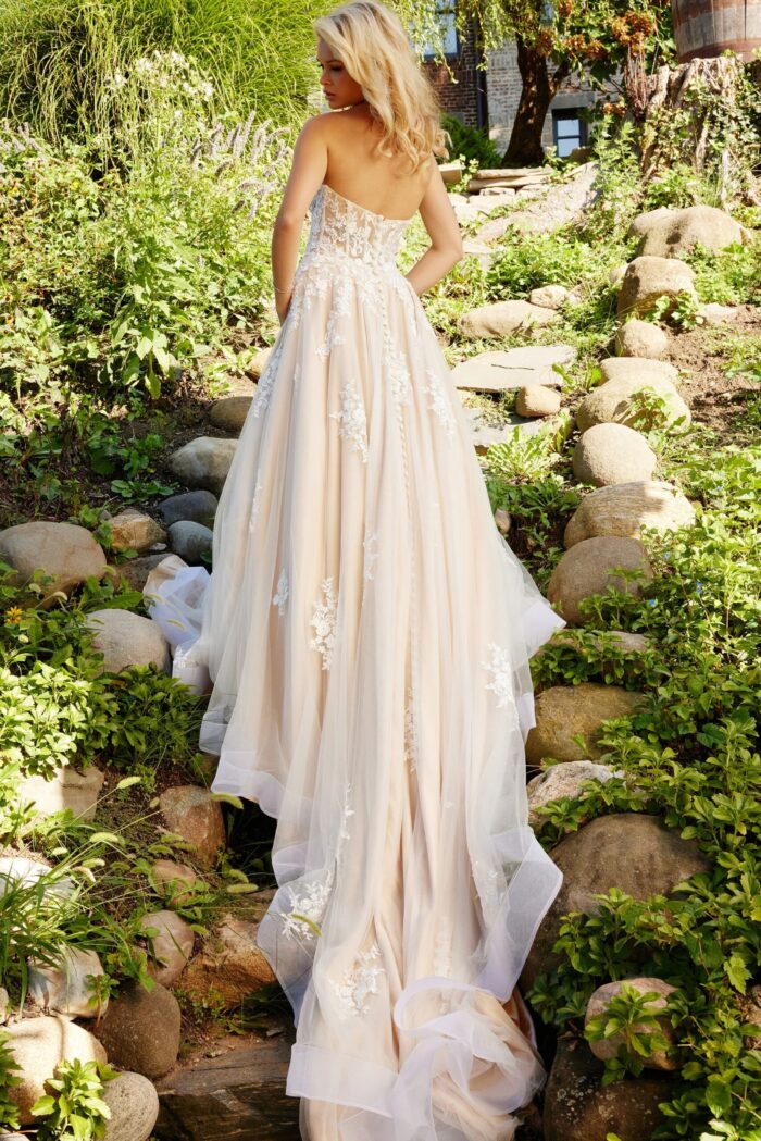 Back view of JB24145 gown showing flowing train and lace detail