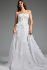 model wearing Jovani JB24560 white strapless gown with floral appliqués, front view