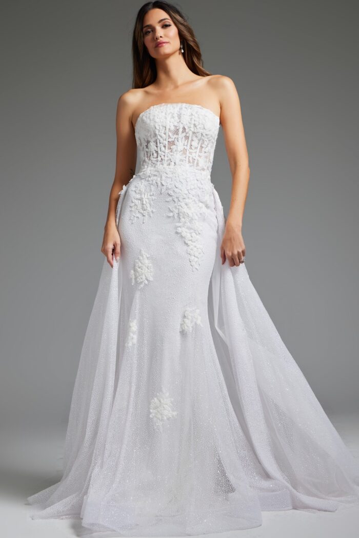 model wearing Jovani JB24560 white strapless gown with floral appliqués, front view