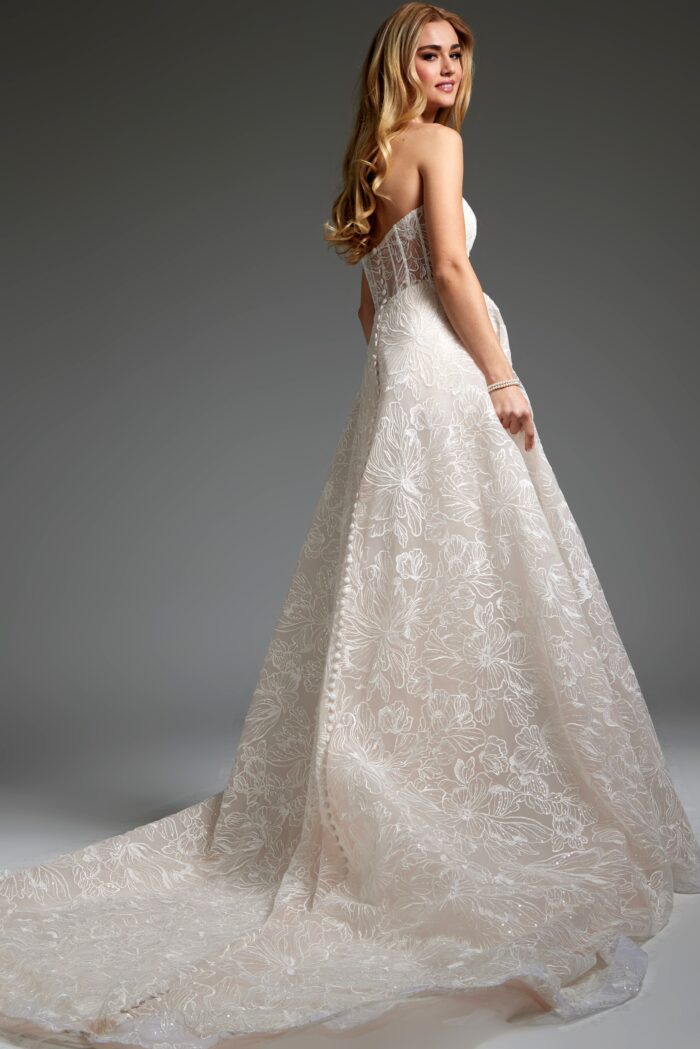 Full-length back view of Jovani JB24653 ivory gown with detailed floral lace.