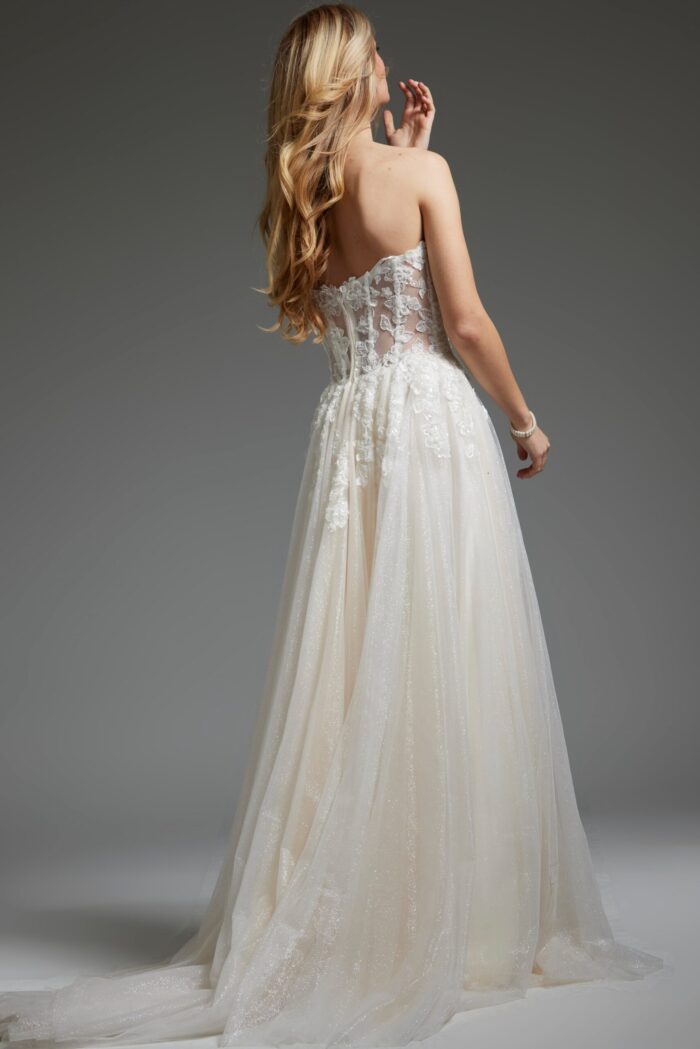 Back view of white Jovani JB25730 gown showing lace detail.