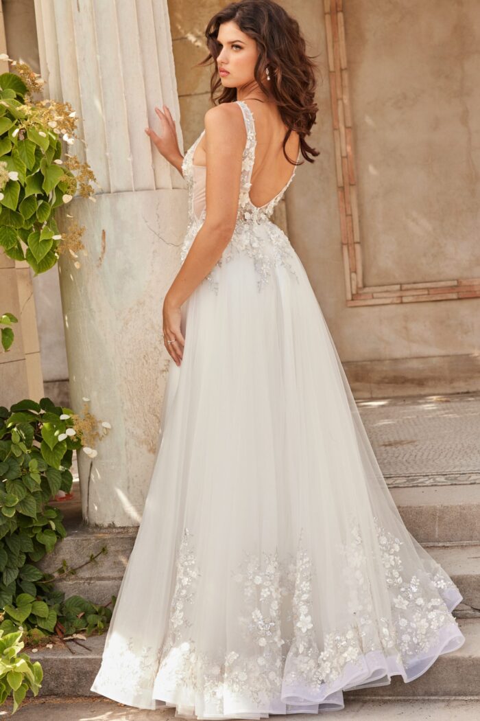 back view of model wearing JB25737 white gown with floral details