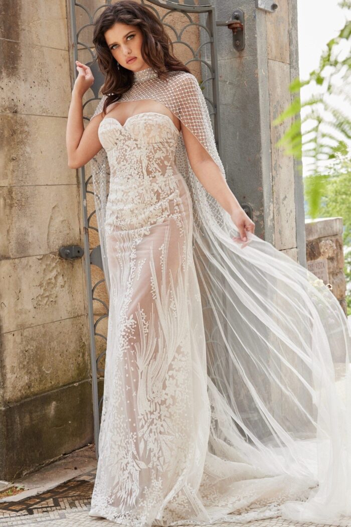 Model wearing JB36547 elegant white dress with exquisite floral details.