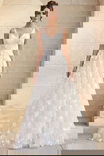 romantic a line wedding dress with deep v back and textured lace detailing