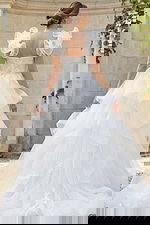 Romantic layered tulle bridal gown featuring floral bodice and soft organza ruffle sleeves