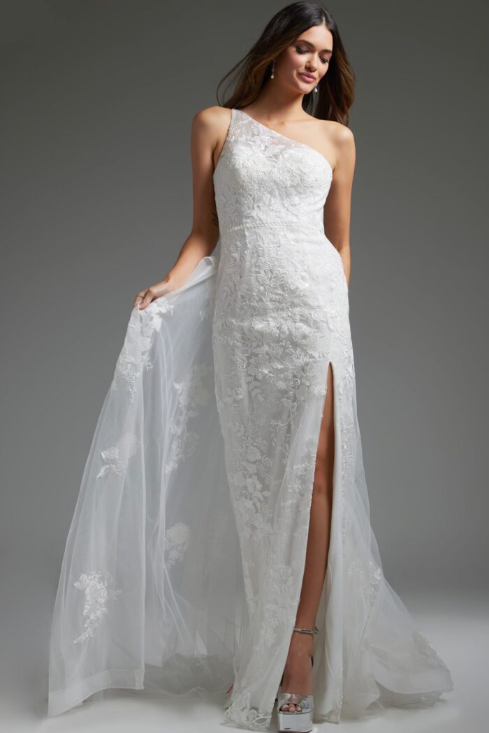 Model displaying Jovani JB37601 white evening gown with lace details.