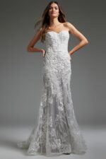 Model wearing Jovani JB38221 front view showcasing the ivory mermaid dress with sweetheart neckline and floral lace design.