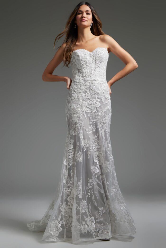 Model wearing Jovani JB38221 front view showcasing the ivory mermaid dress with sweetheart neckline and floral lace design.