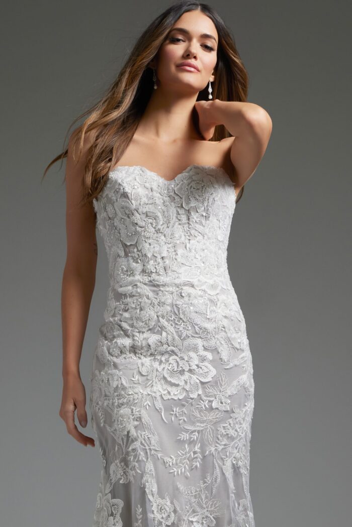 Model wearing Jovani JB38221 ivory dress details with close-up of sweetheart neckline and lace pattern.