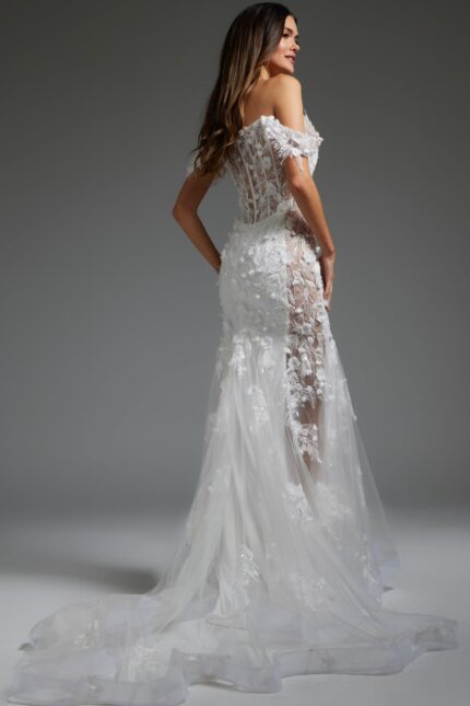 model wearing JB38224 white dress with floral appliqués, back view