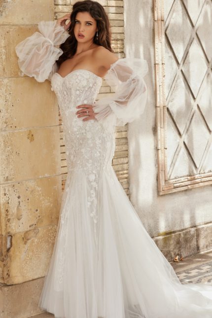 Model wearing Jovani JB38491 white dress with sweetheart neckline and sheer sleeves, front view.