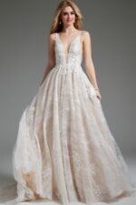 Model wearing Jovani 39435, front view of ivory gown with floral lace and plunging neckline.
