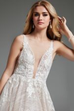Model wearing Jovani 39435, side angle showcasing the gown's lace detailing and flattering silhouette.