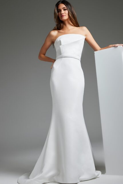 model wearing JB40597 dress with an off-the-shoulder neckline and A-line silhouette in off-white