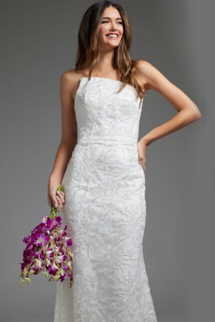Model wearing JB40608 refined white gown holding flowers, showcasing the elegant lace design