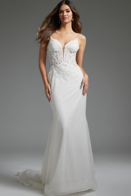 Model wearing Jovani JB40639, an elegant ivory gown with a plunging neckline and intricate lace details from the front.