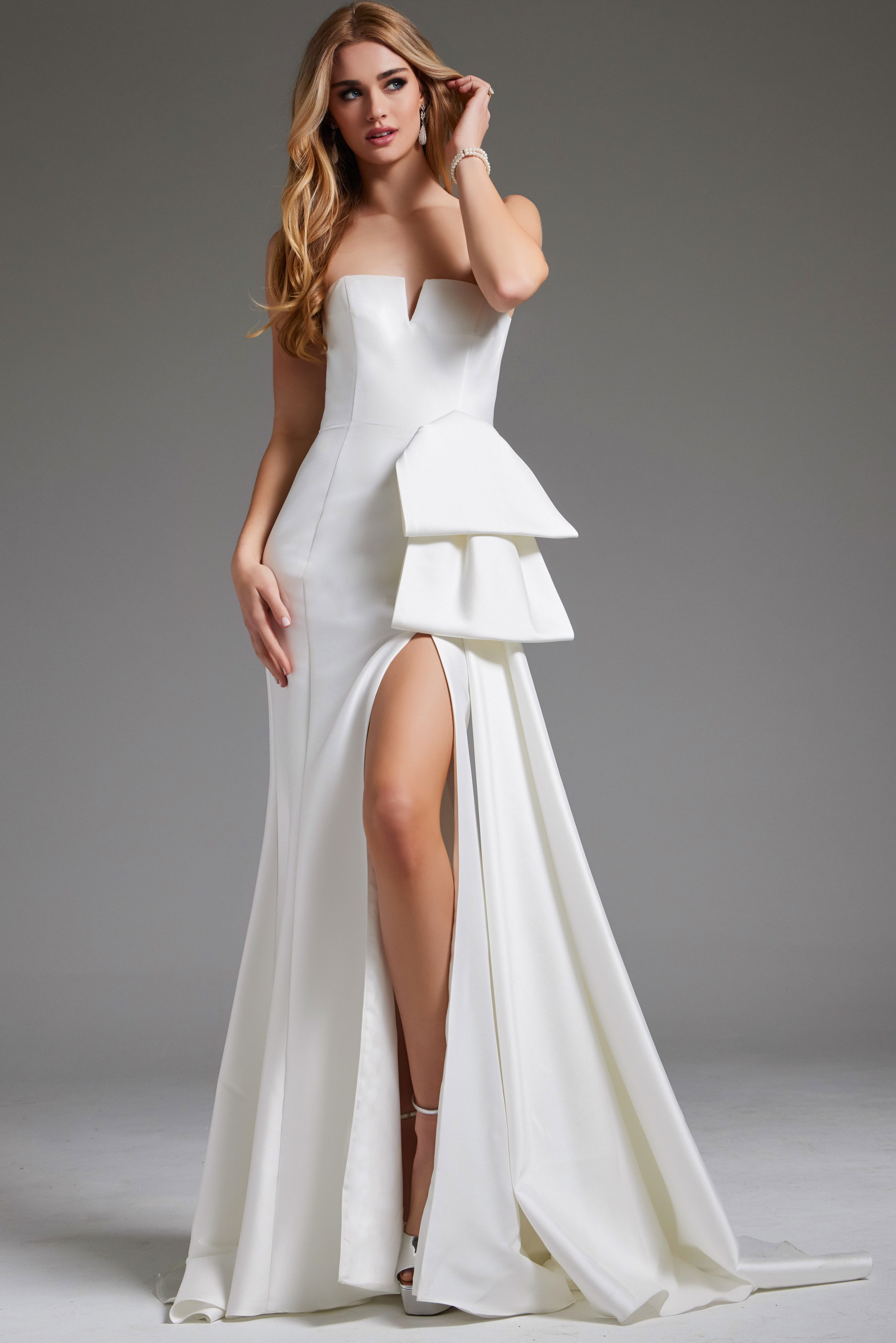 JB40791-OFFWHITE-2040.jpg Model wearing Jovani JB40791 white strapless gown with side detail and slit.